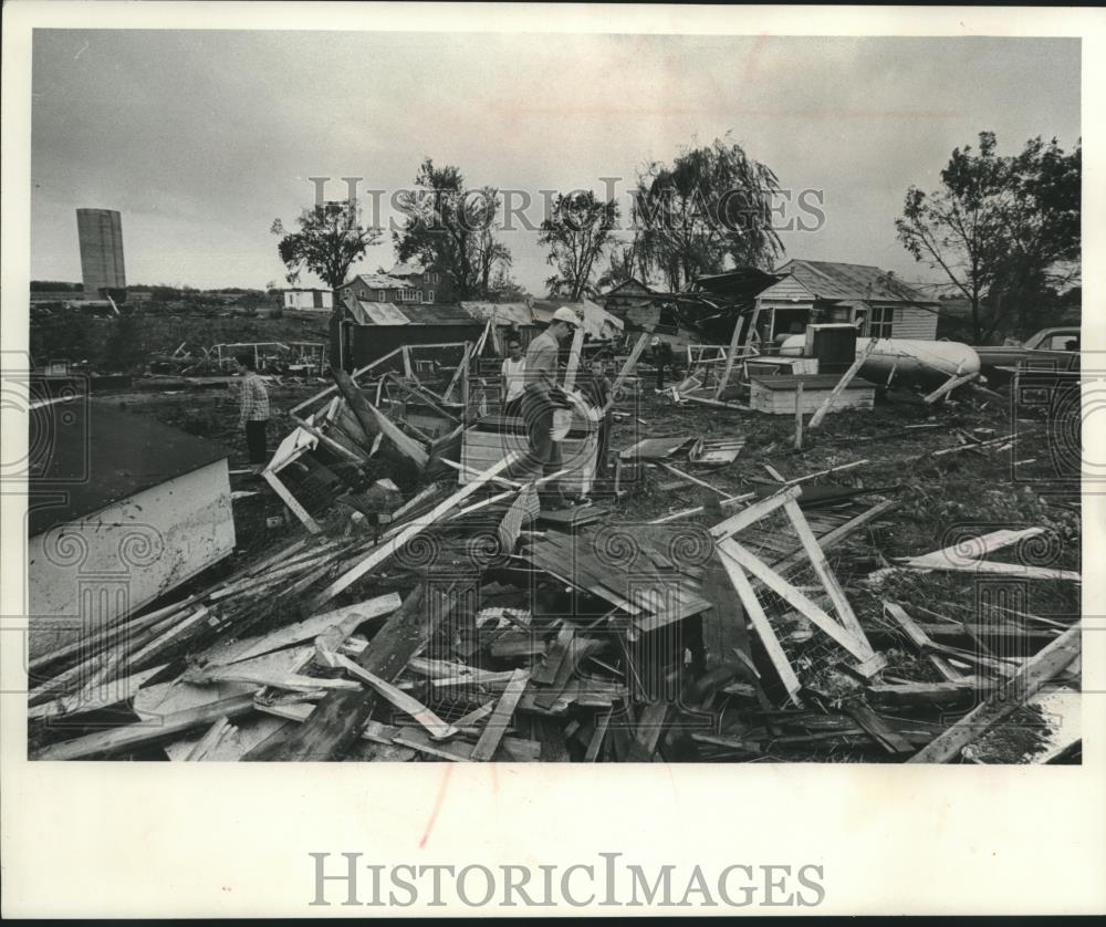 1961 Press Photo Men comb the debris in the wake of destructive tornado ...