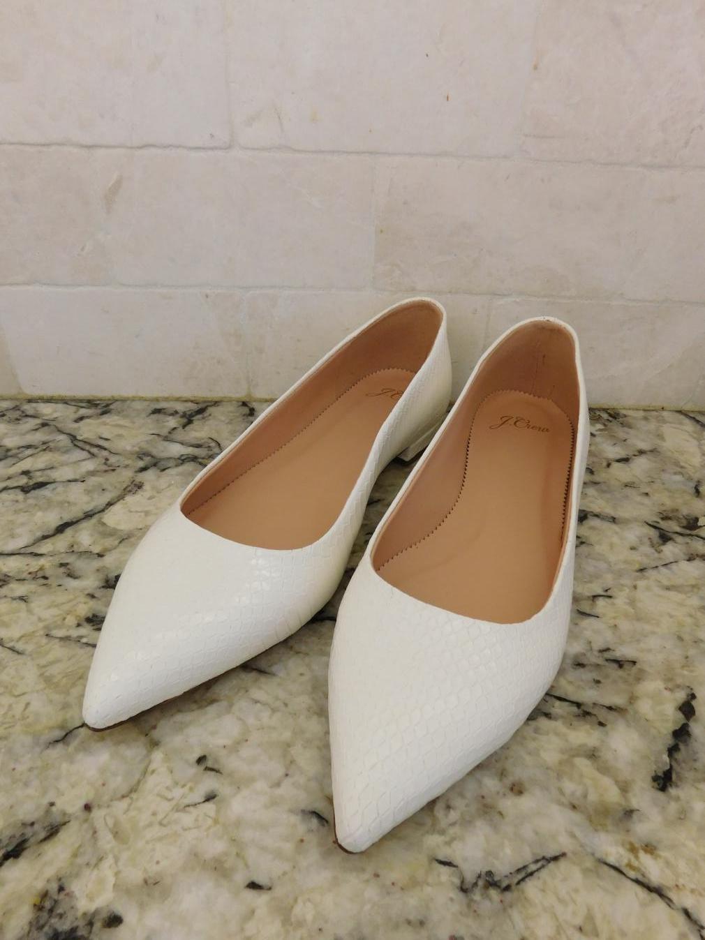 snakeskin pointed toe flats