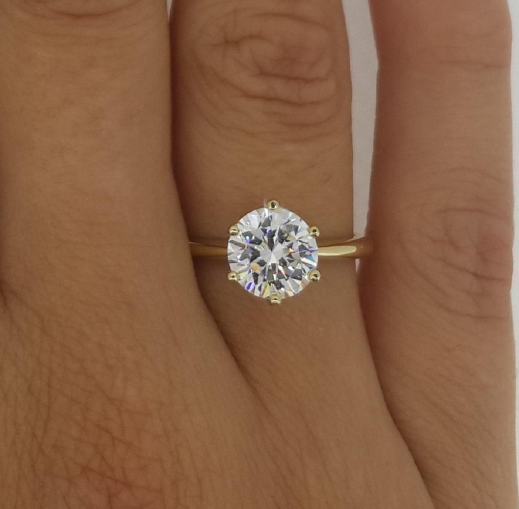 gold ring with circle diamond